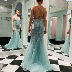 Formal gown. Size 2 fits like 2. Very comfortable.